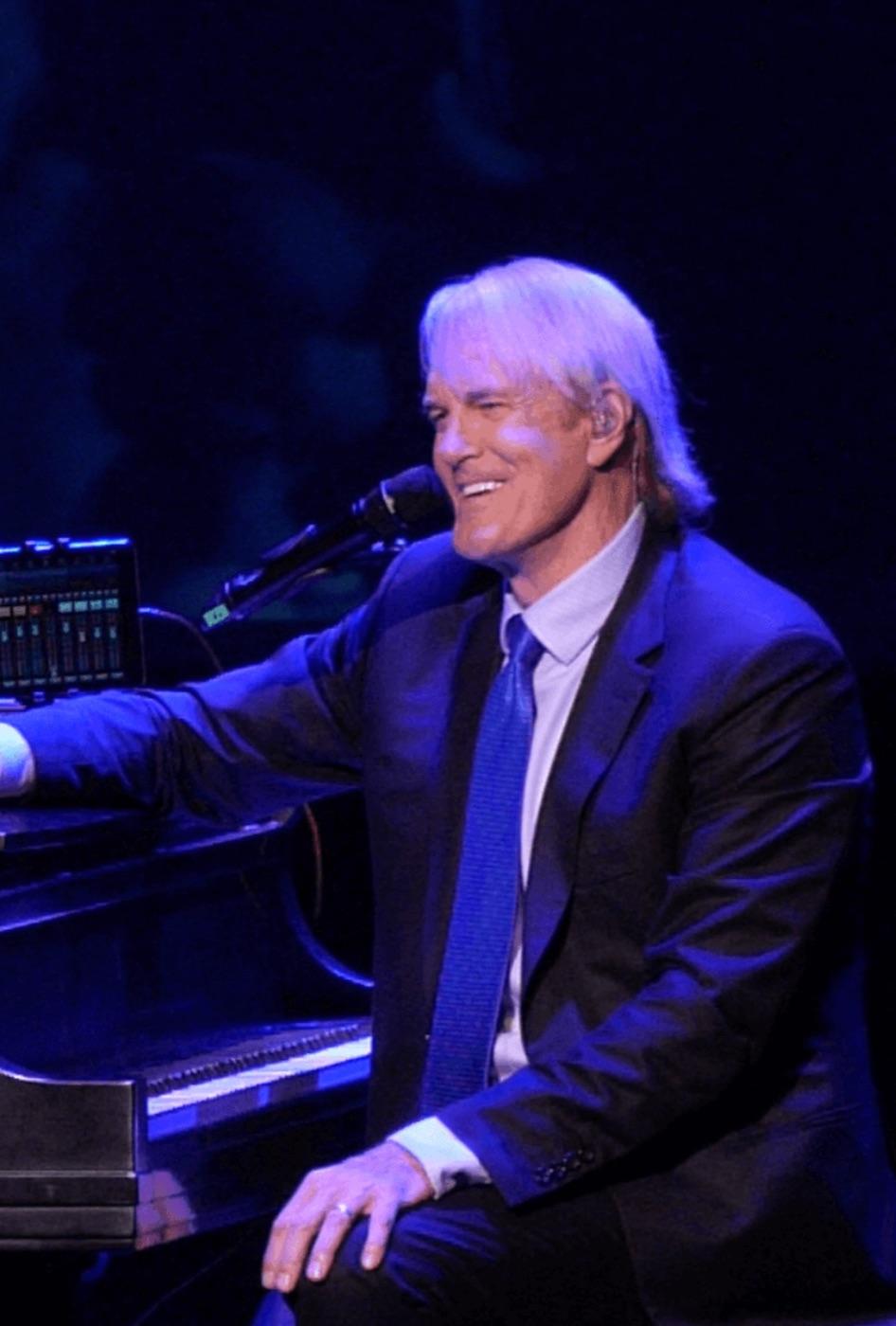 John Tesh at the piano