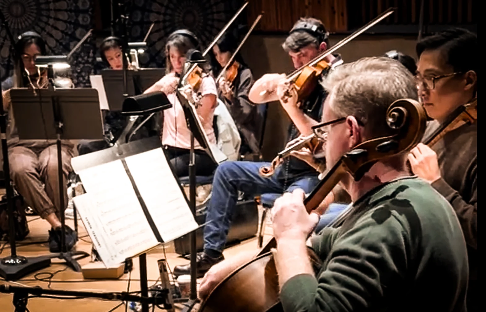 String players performing during the recording sessions
